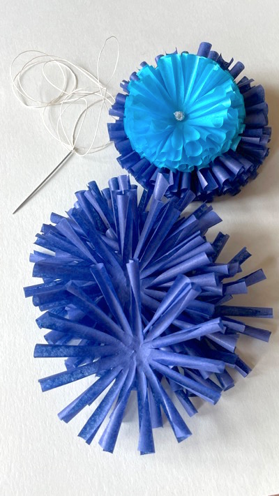 Pompon blau